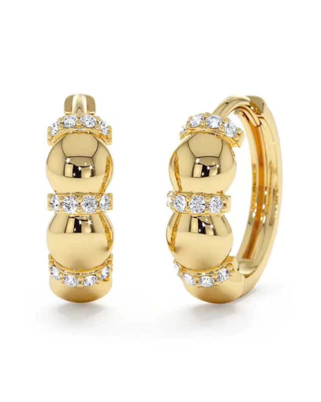 Gold hoop earrings with diamond accents on a white background