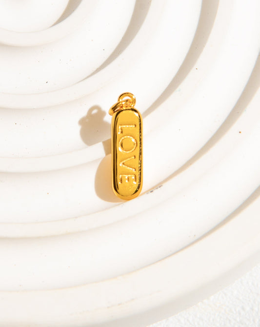 ENGRAVED LOVE PILL CHARM