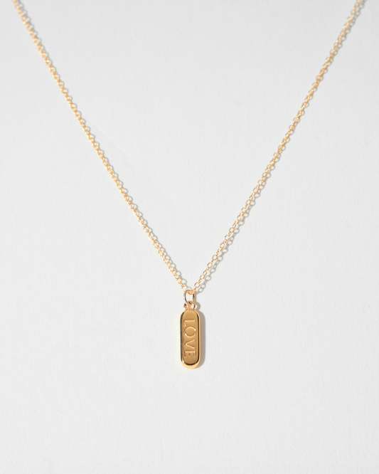 ENGRAVED LOVE PILL NECKLACE